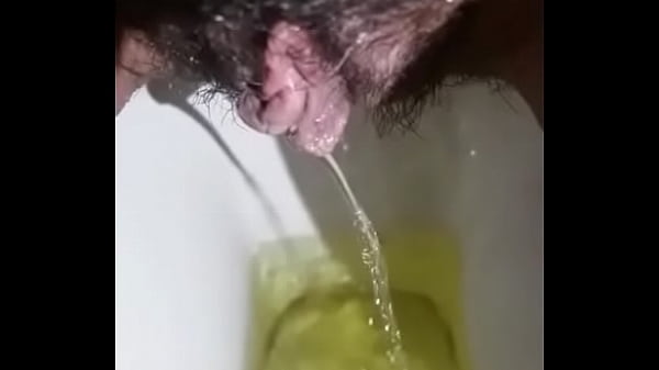 Desi Babe Unleashing Her Golden Stream