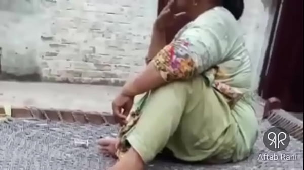 Smoking Hot Desi Aunty Puffs With Sultry Seduction