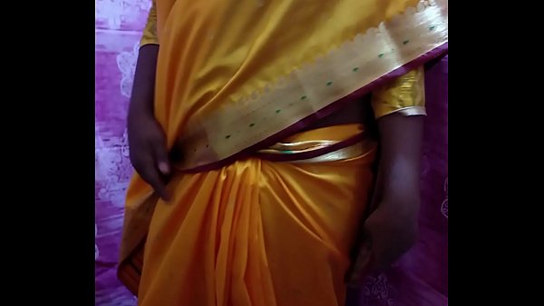 Desi Babe Teasing And Unwrapping Her Curves In A Saree