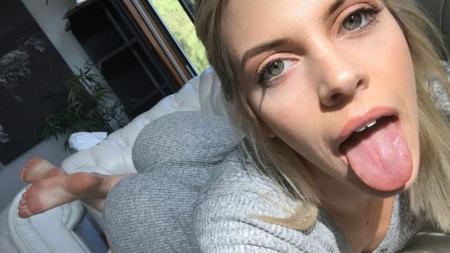 Passionate Blonde Intimacy On The Sofa
